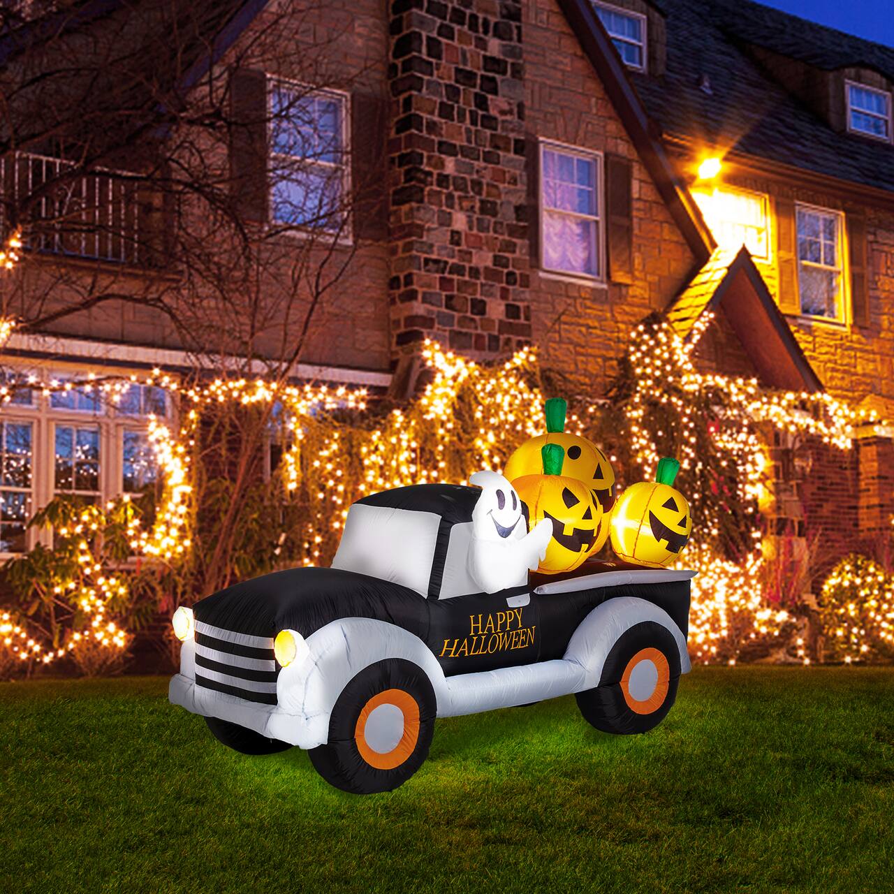 Glitzhome® 8ft. Lighted Inflatable Truck With Jack-O-Lantern Pumpkins Décor